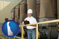 delaware map icon and a mechanical contractor inspecting an industrial ventilation system