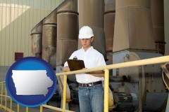 iowa map icon and a mechanical contractor inspecting an industrial ventilation system