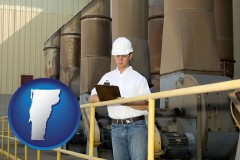 vermont map icon and a mechanical contractor inspecting an industrial ventilation system