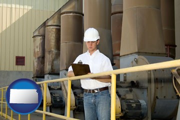 a mechanical contractor inspecting an industrial ventilation system - with Kansas icon
